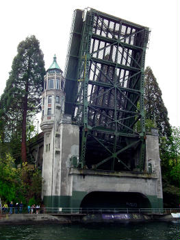 The south end of Montlake Bridge from below during an opening of the bridge, Opening Day of Boating Season, Seattle, Washington, USA.