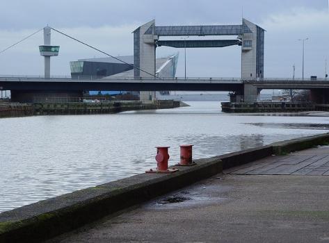 Myton Bridge:Behind the bridge is the tidal barrier and the Deep. The swing bridge enables shipping to enter the river Hull.