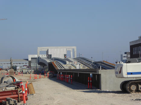 The new Orientkaj Station seen from Helsinkigade on the opening day of Nordhavnsmetroen (the Nordhavn Metro) in Copenhagen : The area around the station is still a construction zone.