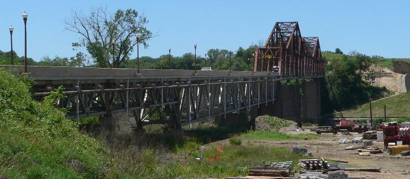 Bridge carrying U.S. Highway 34 across Missouri River east of Plattsmouth, Nebraska : Seen from the northeast. The construction equipment at lower right is working on a new BNSF railroad bridge, out of frame to right.