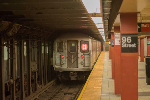 A 10-car consist of Kawasaski R62s leaves 96th Street on the 3 train en route to New Lots Avenue in Brooklyn.
