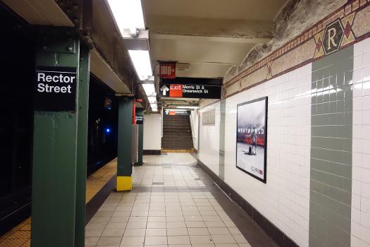 Rector Street IRT station:The south end of the South Ferry-bound platform of the Rector Street IRT station, under Elizabeth Berger Plaza at Greenwich Street and Morris Street in the Financial District, Manhattan.
