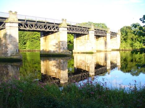 River Dee Railway Bridge:Box girders on the stone piers carry the Aberdeen - Stonehaven railway line over the tidal section of the River Dee beside the Duthie Park.