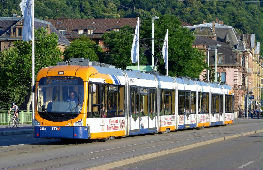 (RNV) tram no. 3288 operating a northbound line 23 service across the Theodor-Heuss-Brücke in , Germany.