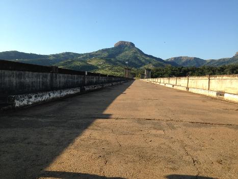 The two-lane road over Nagle Dam wall : Taken facing the entrance to the reserve.