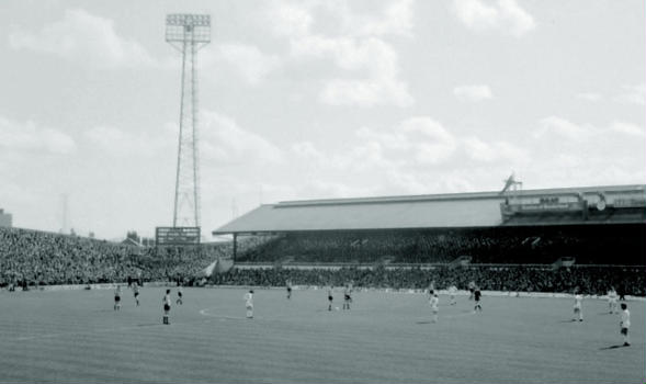 Roker Park August 1976 This is Sunderland about to kick off over 30 years ago against Arsenal. The Roker End to the left is uncovered and the stand opposite was known as the Clock Stand. If you look carefully you can see the Match of The Day cameras on top of the stand.
The ground is now gone and has a housing estate built on it now. I think there maybe a Clock Stand Drive. There is also a Goalmouth Close and of course the aptly named Promotion Close. Happy Days.