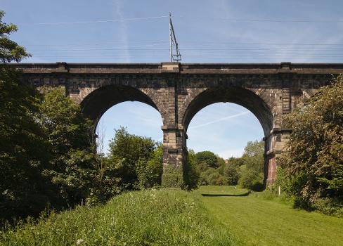 Close view of two of the nine arches of the Sankey Viaduct