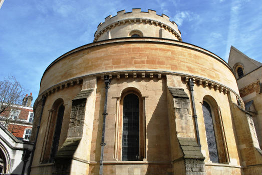 Temple Church, City of London:The Temple Church is a late 12th-century church in the City of London located between Fleet Street and the River Thames, built by the Knights Templar as their English headquarters. During the reign of King John (1199–1216) it served as the royal treasury, supported by the role of the Knights Templars as proto-international bankers. It is jointly owned by the Inner Temple and Middle Temple[2] Inns of Court, bases of the English legal profession. It is famous for being a round church, a common design feature for Knights Templar churches, and for its 13th and 14th century stone effigies. It was heavily damaged by German bombing during World War II and has since been greatly restored and rebuilt. The area around the Temple Church is known as the Temple and nearby formerly in the middle of Fleet Street stood the Temple Bar, an ornamental processional gateway. Nearby is the Temple Underground station.