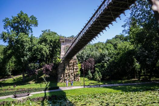 The suspended bridge connecting two hill tops, in the Nicolae Romanescu Park, Craiova