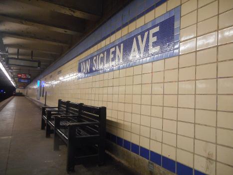 Bench along the Euclid Avenue -bound platform of the Van Siclen Avenue Subway station on the IND Fulton Street Line : Located in the East New York section of Brooklyn, New York City. Note also the mosaics along the platform as well as the blank Public Address Customer Information Screen and the "No Exit" sign in the background, the latter of which was where the photographer captured his first picture of the station.