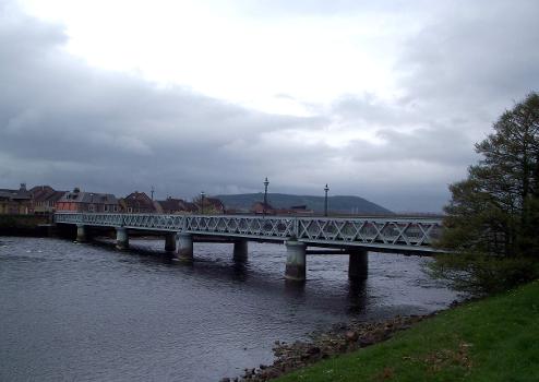 Waterloo bridge, Inverness : Looking from upstream on the east (Town Centre) side.
Waterloo bridge is known locally as the Black Bridge, due to the original bridge being built of a very dark coloured wood. The wooden bridge was constructed in 1808 to connect the village of Merkinch which was incorporated into the burgh of Inverness the same year. The bridge was struck by the wreckage of one of the Ness Island bridges during the Great flood of 1849.
The wooden bridge survived the flood and stood until 1896 when it was replaced with the lattice-girder structure we see today. The present Waterloo bridge was built by the Rose Street Foundry, now A.I. Welders.
&lt;a href=" http://www.nessriver.co.uk/pages/nessriver/waterlooBridge.html " rel="noreferrer nofollow"&gt;www.nessriver.co.uk/pages/nessriver/waterlooBridge.html&lt;/a&gt;