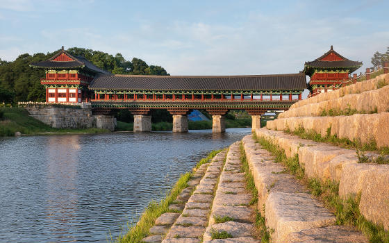 Woljeonggyo Bridge and stone steps with grass on the bank