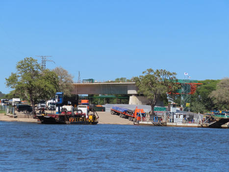 Ferry landing at Kazungula on the Botswana side of the Zambezi River with bridge under construction in the background