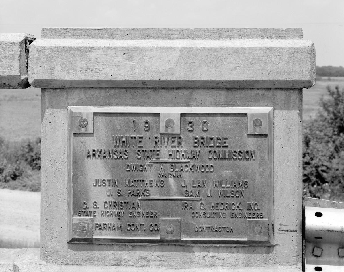 White River Bridge: Plate Detail view of bridge dateplate which reads: 
1930 
White River Bridge 
Arkansas Highway Commission 
Dwight Blackwood, Chairman 
Justin Matthews, J. Lan Williams 
J.S. Parks, Sam J. Wilson, Commissioners 
C.S. Christian, State Highway Engineers, Ira G. Hedrick, Inc., Consulting Engineers 
Parham Cont. Co., Contractor 
Augusta Bridge, Spanning White River at Highway 64, Augusta, Woodruff County, Arkansas, USA