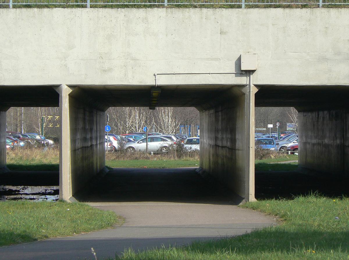 Flood relief arches under the northern ramp onto the bridges, also used for pedestrian and cycle access. Flood relief arches under the northern ramp onto the bridges, also used for pedestrian and cycle access.