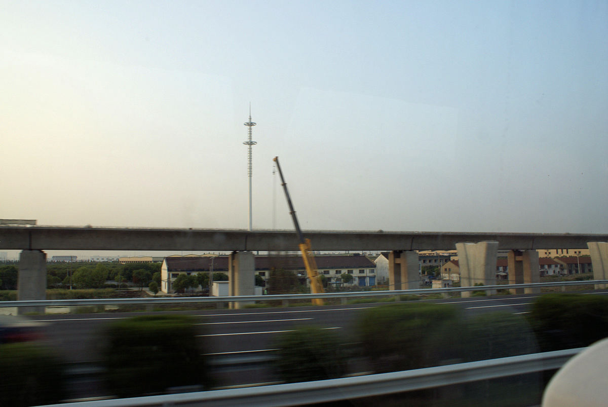 Structures of the Beijing-Shanghai high-speed rail line under construction along the highway between Nanjing and Shanghai 