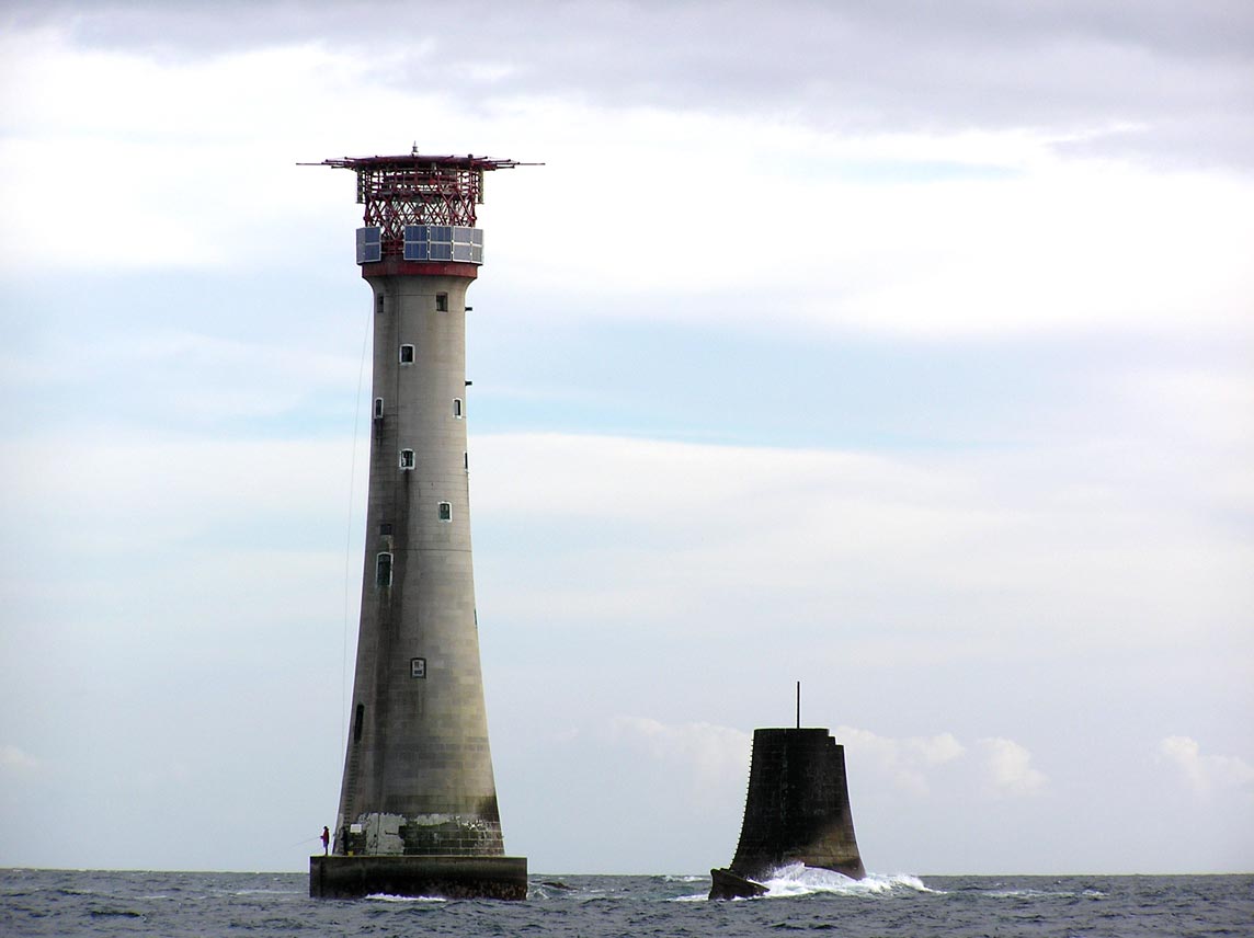Current Eddystone Lighthouse next to the foundations of the older tower designed by John Smeaton 