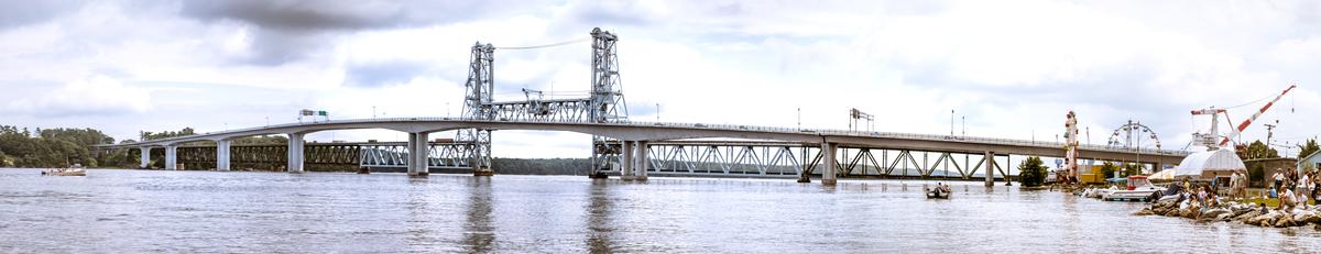 Media File No. 265644 Panoramic view of Sagadahoc Bridge, carrying U.S. Route 1 over the Kennebec River in Bath, Maine. Seen behind the Sagadahoc Bridge is the Carlton Bridge, a vertical lift railroad bridge with an upper deck that formerly carried U.S. Route 1.