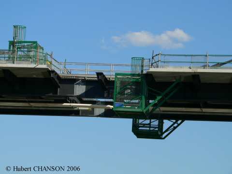 Media File No. 71780 Eleanor Schonell Bridge, Brisbane. Skeleton of the central key section installed on 11Aug. 2006; photograph taken on 15 Aug. 2006 from the ferry looking upstream at the steel structure; a footbridge allowed access from one end of the other of the bridge