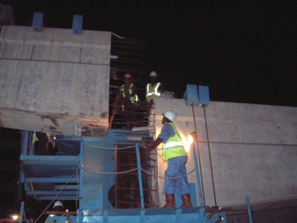 Nighttime launching of the guideway beams by autocrane 