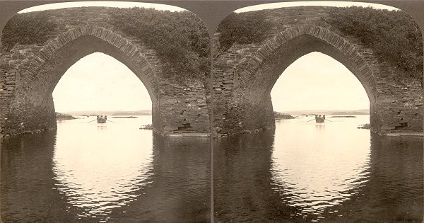 Looking through Brickeen Bridge to the Lower Lake, Killarney, Ireland Stereoscopic view around 1900.