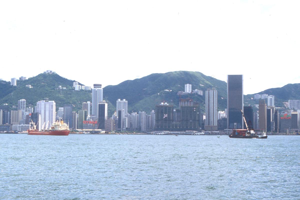 Hong Kong skyline with the Furama Hotel and HSBC Bank under construction 