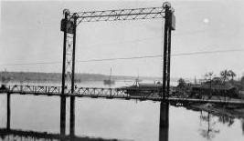 Bridge with the concrete counterweights which were removed in the 1940's. Photographer unknown 
