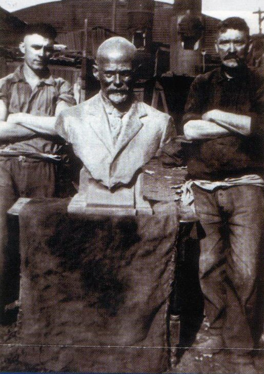 Media File No. 43493 Bust of Carlo Catani after being taked out of the furnace. Made by Thomas Mills and his son Stanley (also pictured). From the private collection of Anthony Mills