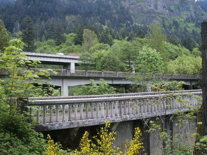 Moffett Creek Bridge and adjacent Interstate 84 bridges (c.1950 and 1969) overshadowed by the cliffs of the Columbia River Gorge 