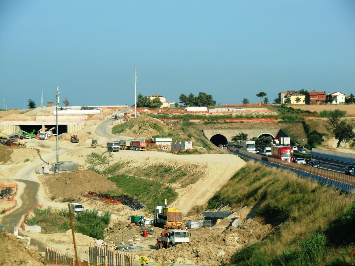 Scacciano tunnel under construction on the left, and Scacciano two lanes tunnel nothern portals 