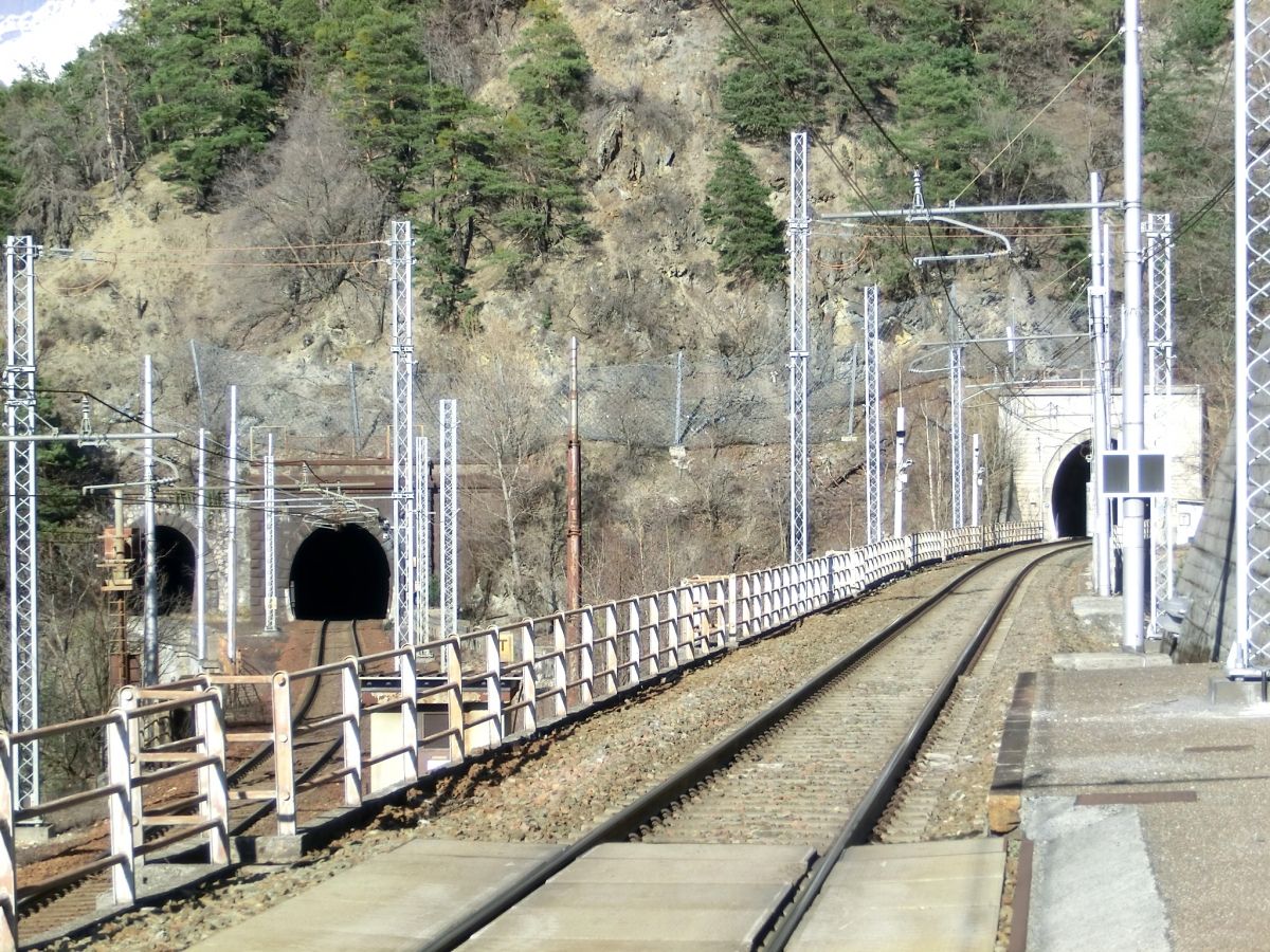(from left to right) Aquila Tunnel (out of service), Exilles North Tunnel (eastbound) and Exilles South Tunnel (westbound) western portals 