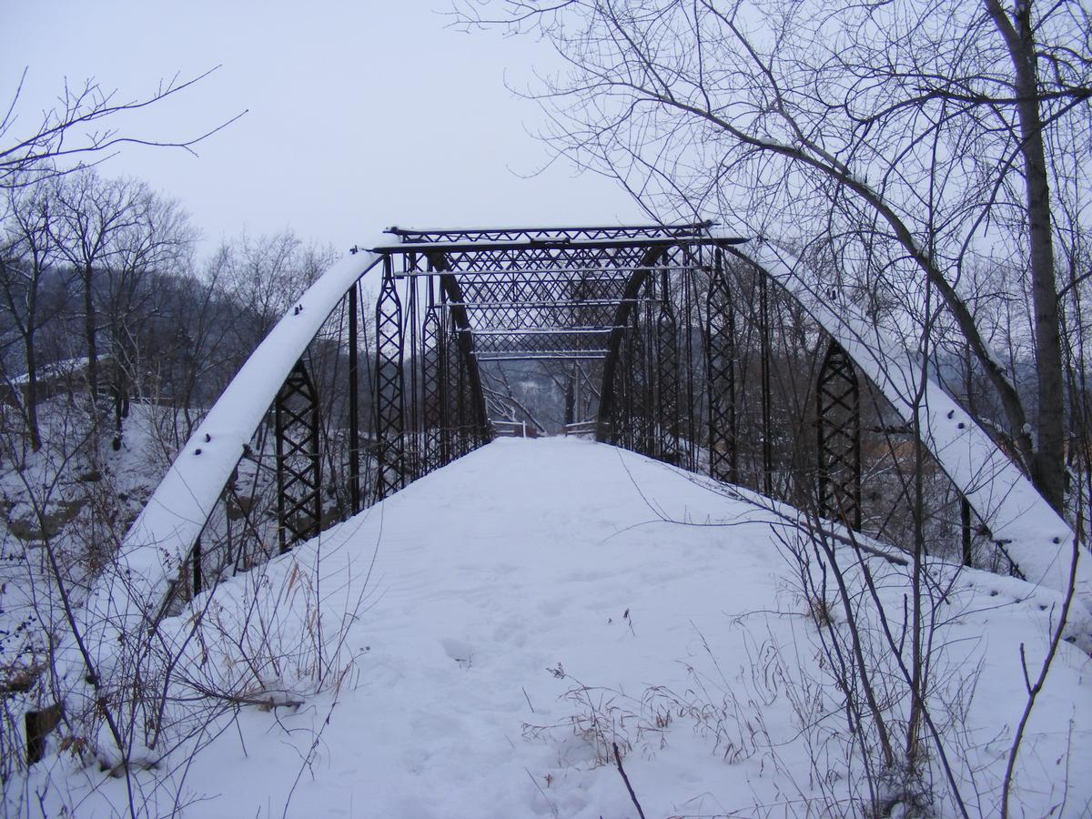 Media File No. 102386 Located over the Le Seuer River on Twp. Rd. 190 in Mankato Twp. near Skyline. Built in 1873 by the Wrought Iron Bridge Company of Canton, OH, the 190 ft. long bridge is the longest of its type in the USA and the second longest in the world
