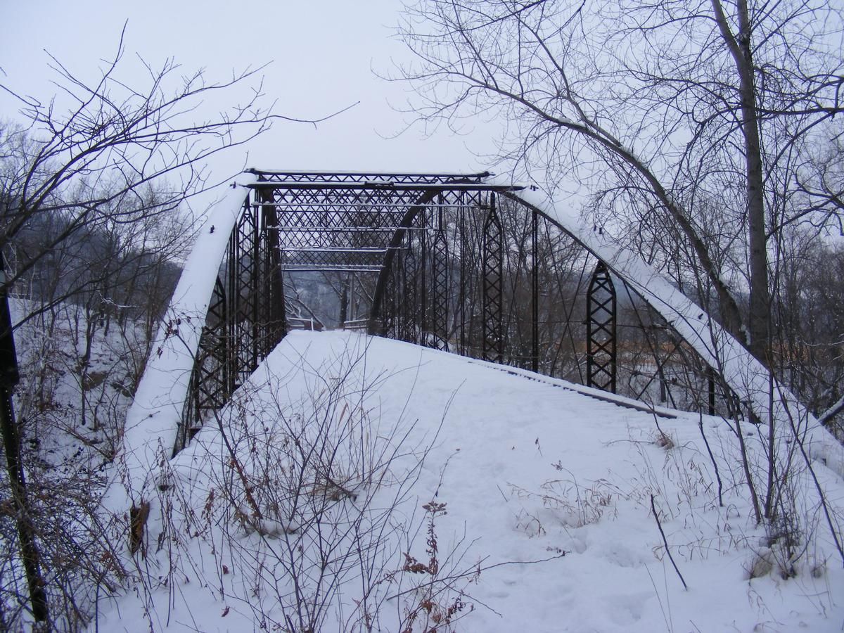 Media File No. 102389 Located over the Le Seuer River on Twp. Rd. 190 in Mankato Twp. near Skyline. Built in 1873 by the Wrought Iron Bridge Company of Canton, OH, the 190 ft. long bridge is the longest of its type in the USA and the second longest in the world