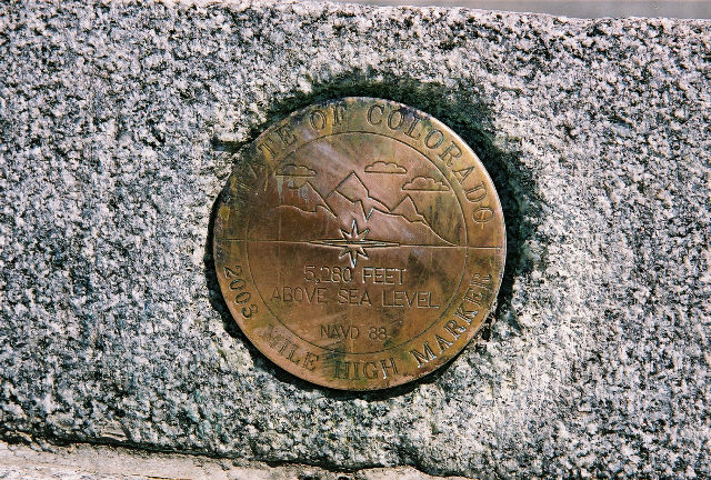 This is a plaque on the capitol steps indicating the exact altitude of 5,280 feet, one mile high 
