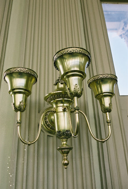 A brass light fixture inside the dome 