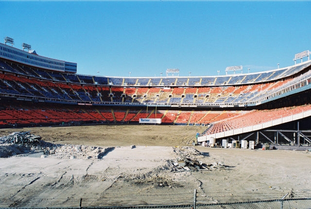 Last large section of the Mile High stadium during demolition : r