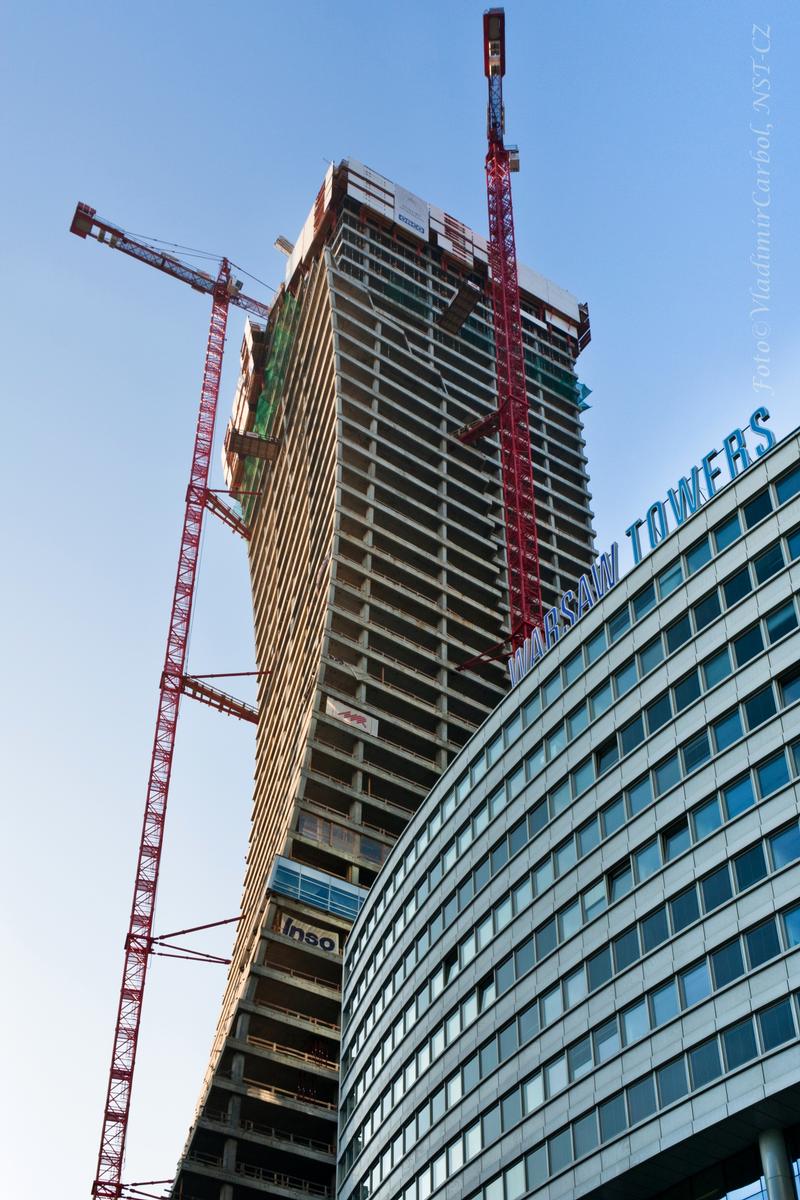 The Złota 44 Building behind of Warsaw Towers 
