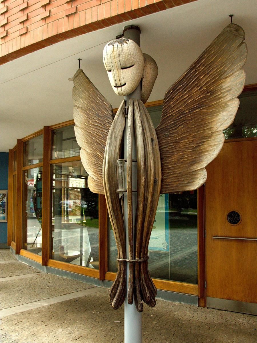 One of the decorative wooden statues 