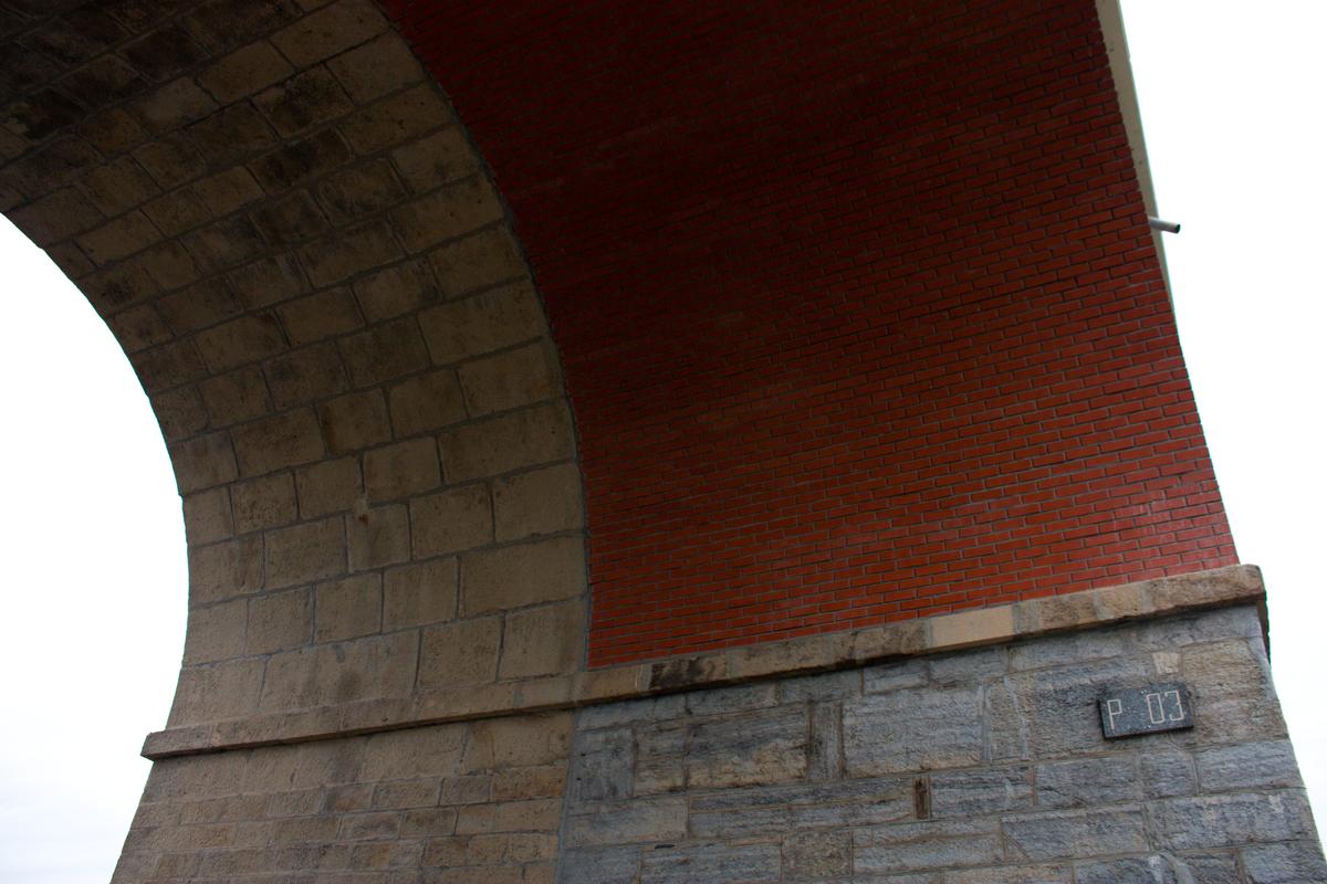 Viaduct arch detail view to stone and brick vault with the pillar No.03 