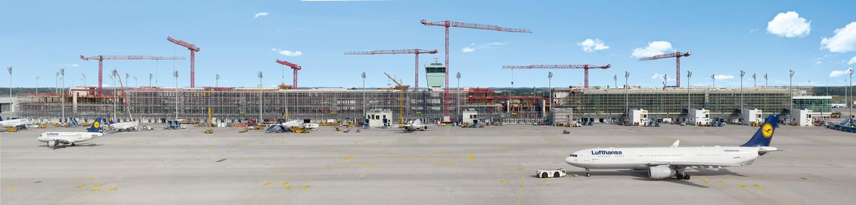 Mediendatei Nr. 225980 Der 600 m lange, neue Satellitenterminal am Flughafen München befindet sich inmitten des Flugfelds, es umschließt den Vorfeldtower und gründet auf der vorhandenen Gepäcksortieranlage. Das Bauen im laufenden Betrieb ist eine enorme Herausforderung für alle Projektbeteiligten