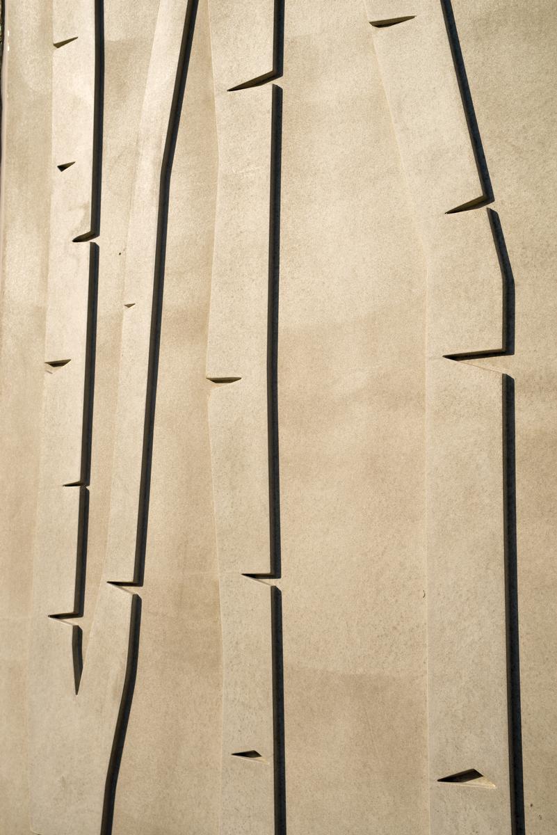 Light and shadow bring textured concrete surfaces to life. 