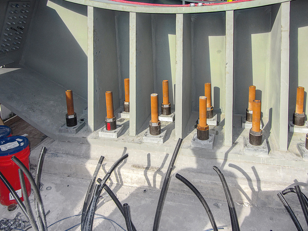 Five groups of 20-24 post-tensioning bars are embedded multiple feet in to each pier cap. 