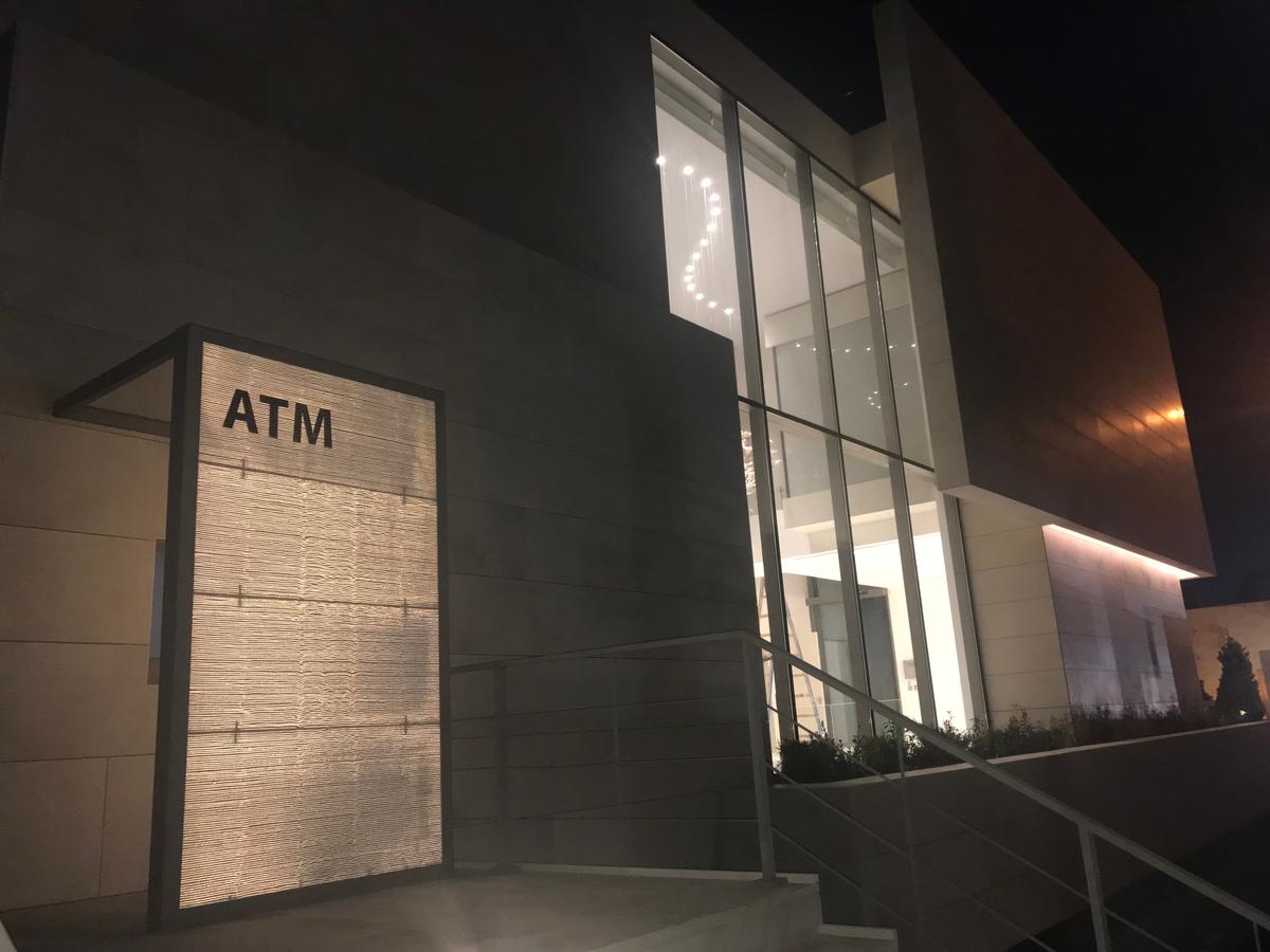 The ATM areas were also designed with a backlit translucent concrete wall. 