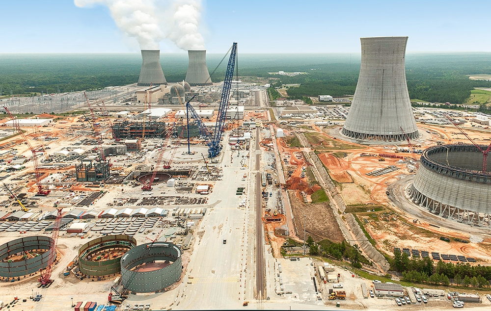 Construction site of Plant Vogtle Units 3 and 4; in the background, Units 1 and 2 are steaming. Construction site of Plant Vogtle Units 3 and 4; in the background, Units 1 and 2 are steaming.