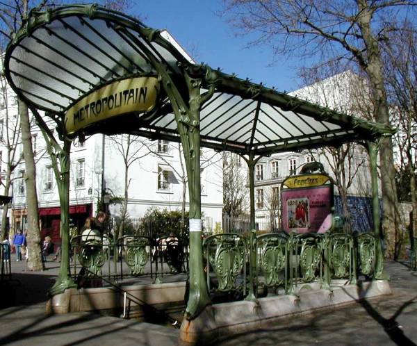 Entrance to the Paris metro at Place des Abbessess by Hector Guimard 