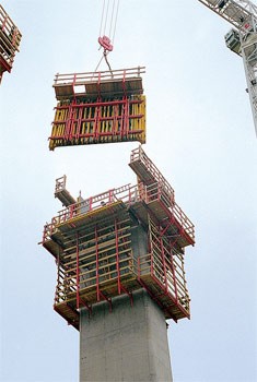 PERI VARIO formwork panel being lowered into position 