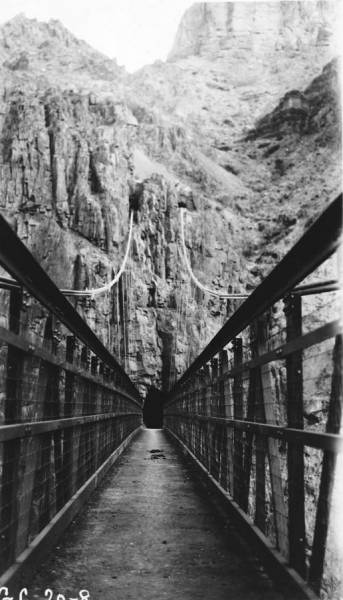 Kaibab Trail Suspension Bridge View looking along bridge toward tunnel of south approach. Main cable tunnels also shown 
(HAER, ARIZ,3-GRACAN,3-3)