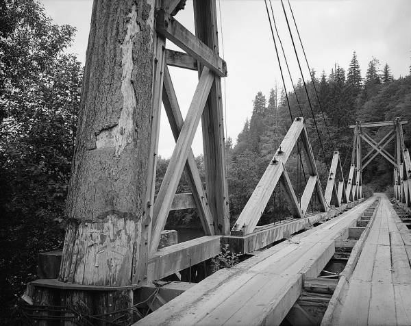 Chow Chow Bridge Three-quarter view of bridge showing tower, king post trusses, and suspension cables (HAER, WASH,14-TAH.V,1-4)