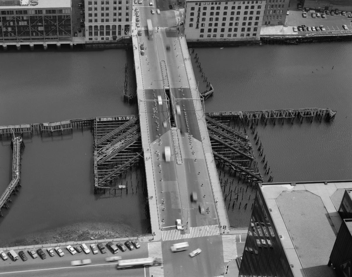 Media File No. 199246 View southeast, serial, showing entire bridge. - Summer Street Retractile Bridge, Spanning Fort Point Channel at Summer Street, Boston, Suffolk County, MA (HAER MASS,13-BOST,87–5)