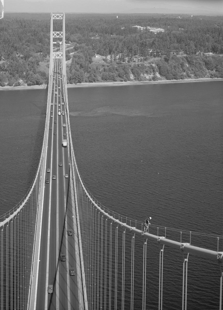 Roadway and western tower as seen from eastern tower Wolfgang Mayr summer ICOMOS intern on cable for scale (HAER WA-99-7)